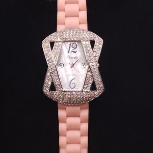 Xanadu women's analogue watch with a crystal-encrusted case and a pink silicone